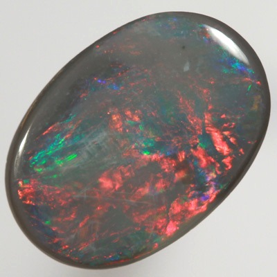 SOLID BLACK OPAL Bright red contrasted by green SEE VIDEOS